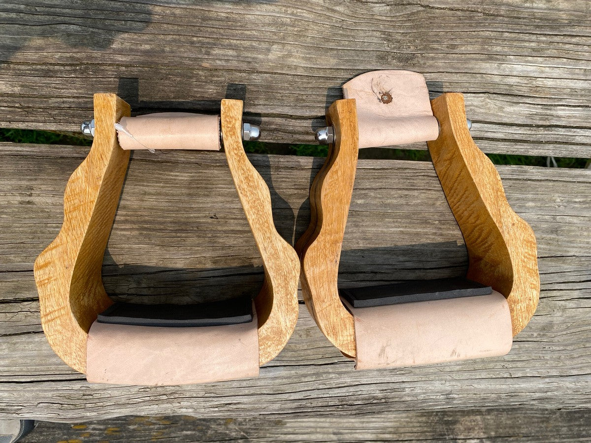Showman Solid wood stirrups on wood surface
