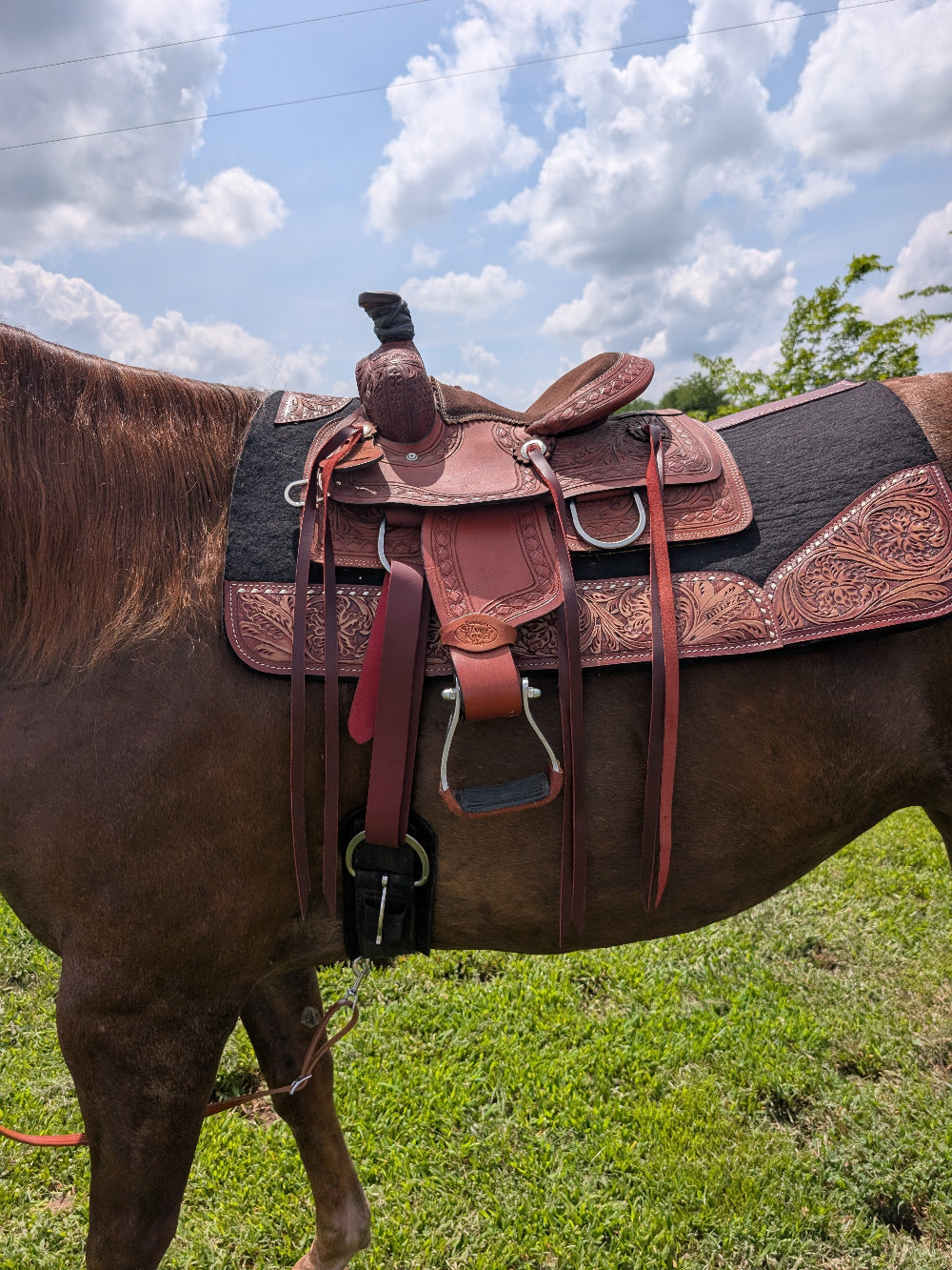 Silver Royal Youth Split Rail Ranch Saddle with rich mahogany finish and basketweave tooling