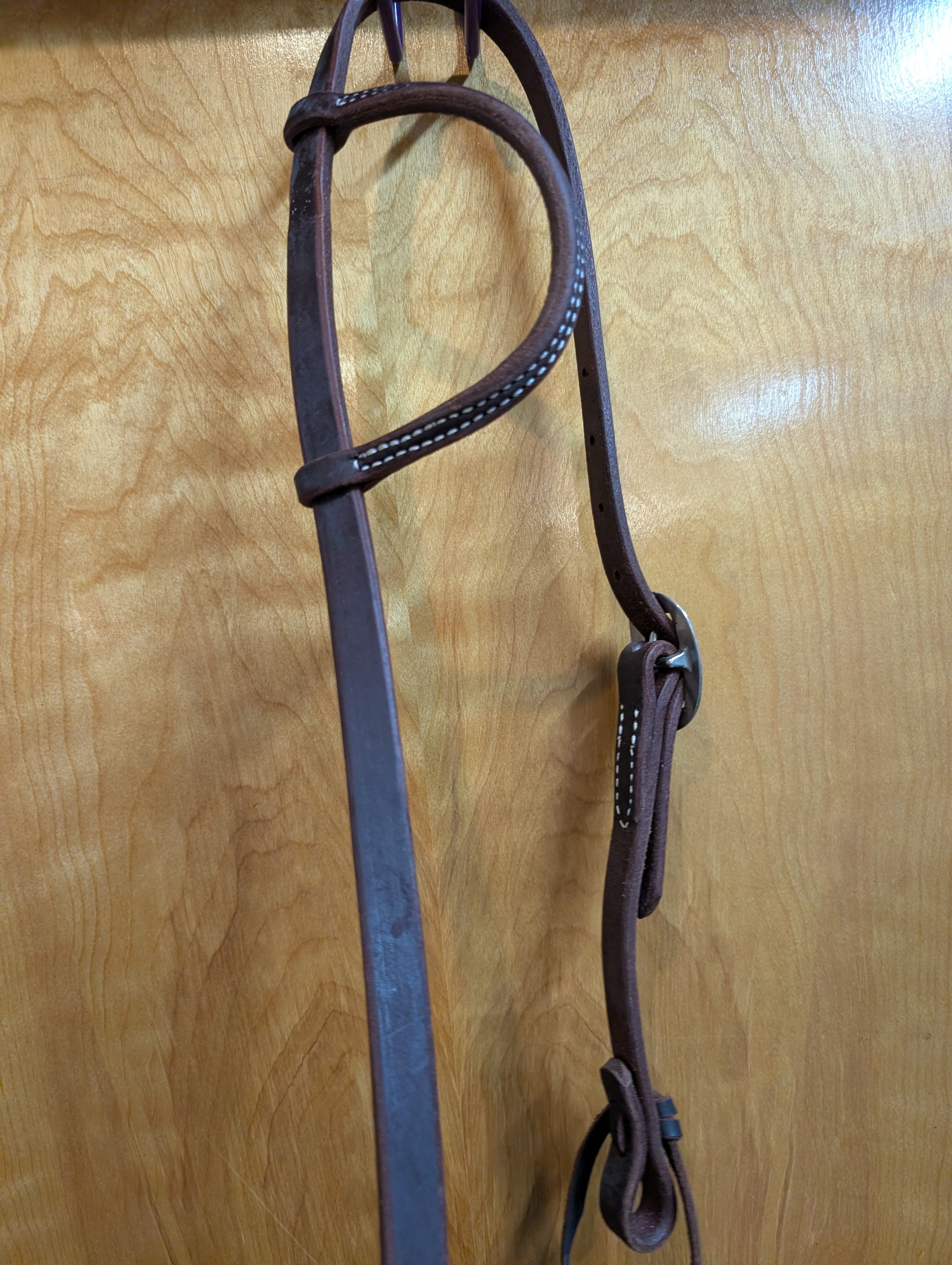 Sliding ear oiled headstall