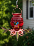 Red hummingbird feeder with 'More Birds' logo, surrounded by hummingbirds