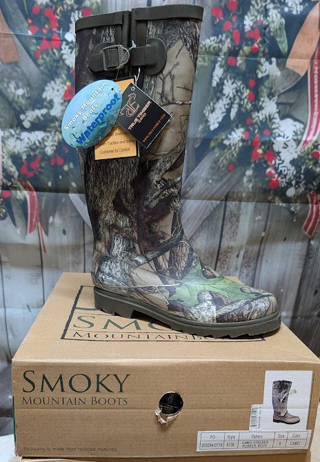 Camouflage boot on a Smoky Mountain Boots box with a Christmas-themed background