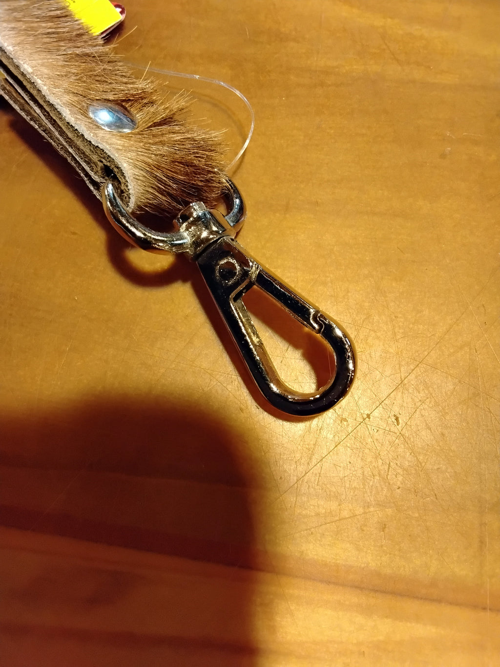 Close-up of the snap on the wristlet strap