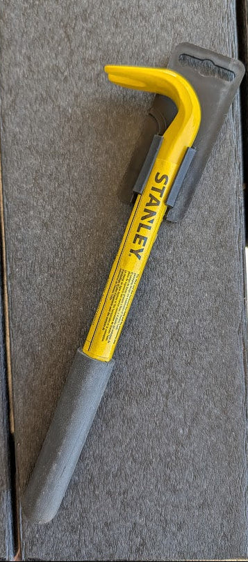 Stanley 10in Nail Puller with a gray background. 
