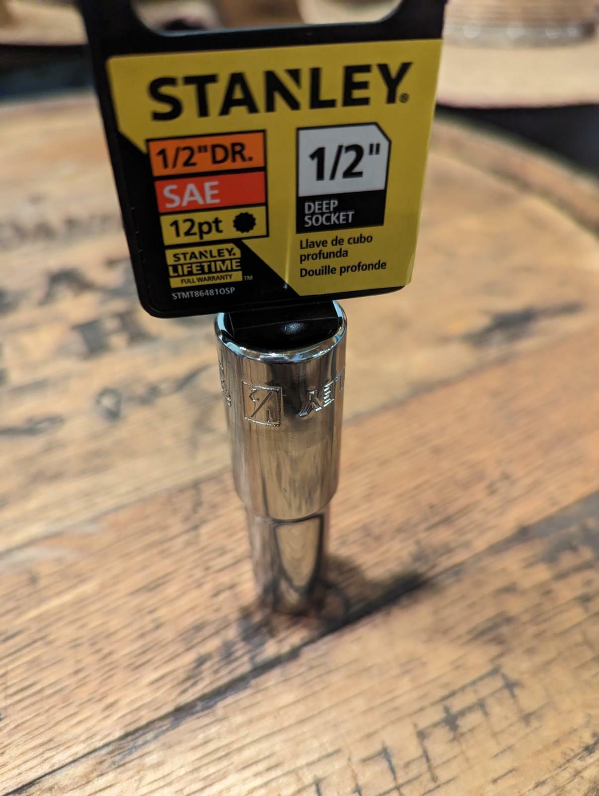 Stanley deep socket on a wooden surface