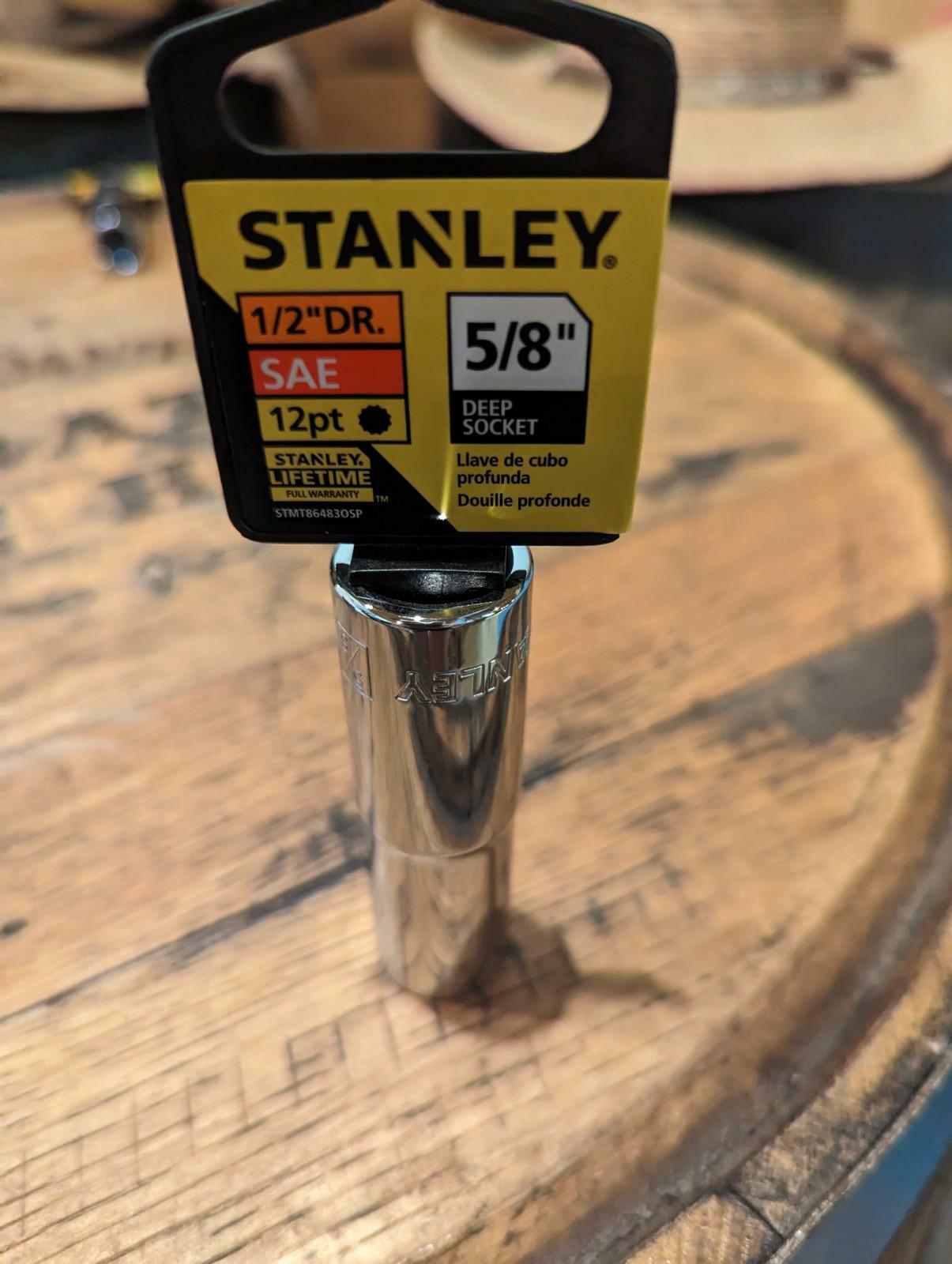 Stanley deep socket on a wooden surface