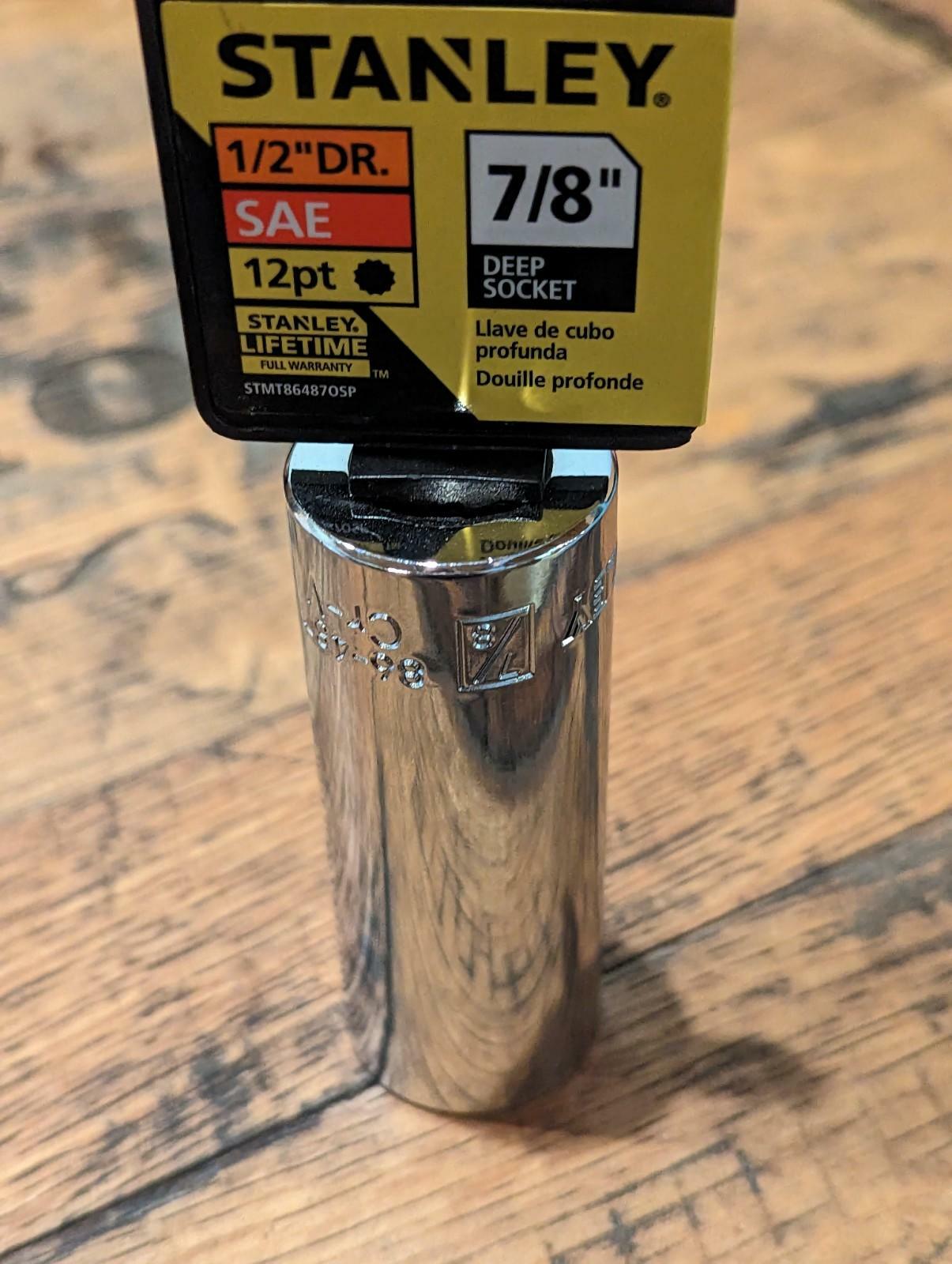 Stanley 7/8 inch deep socket on a wooden surface