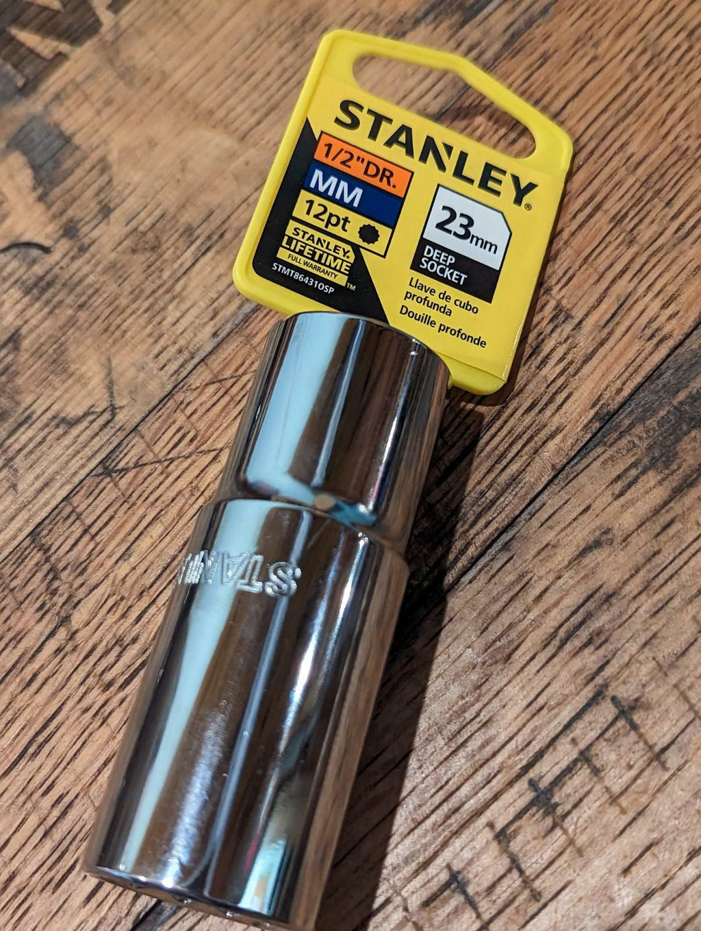Stanley tool socket on a wooden surface