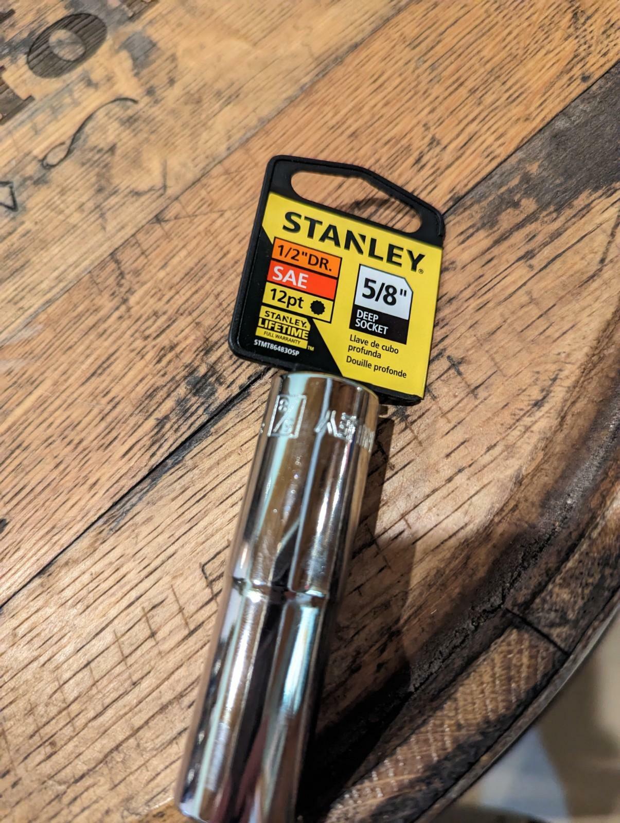 Stanley socket tool on a wooden surface