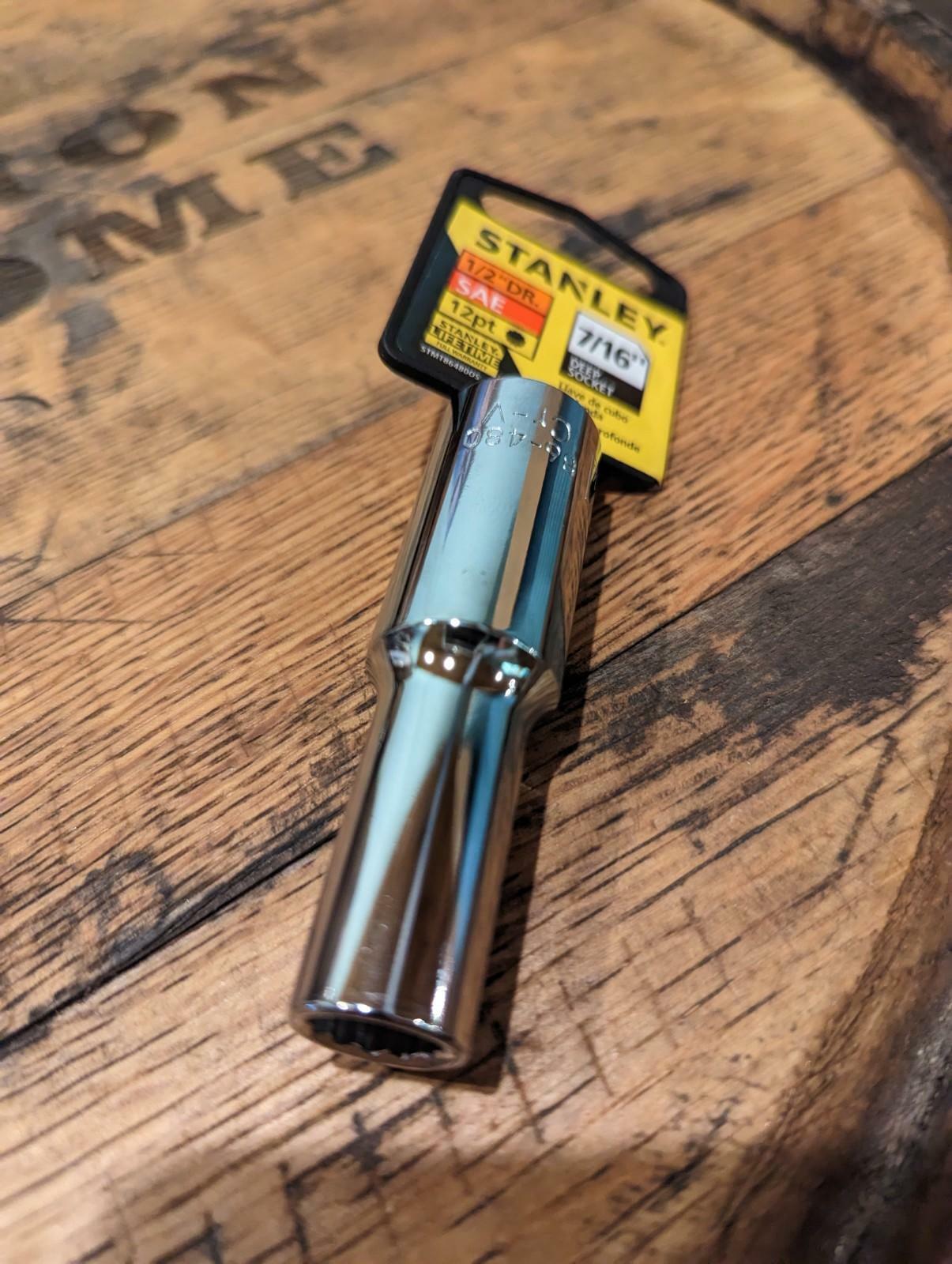 Stanley socket tool on a wooden surface