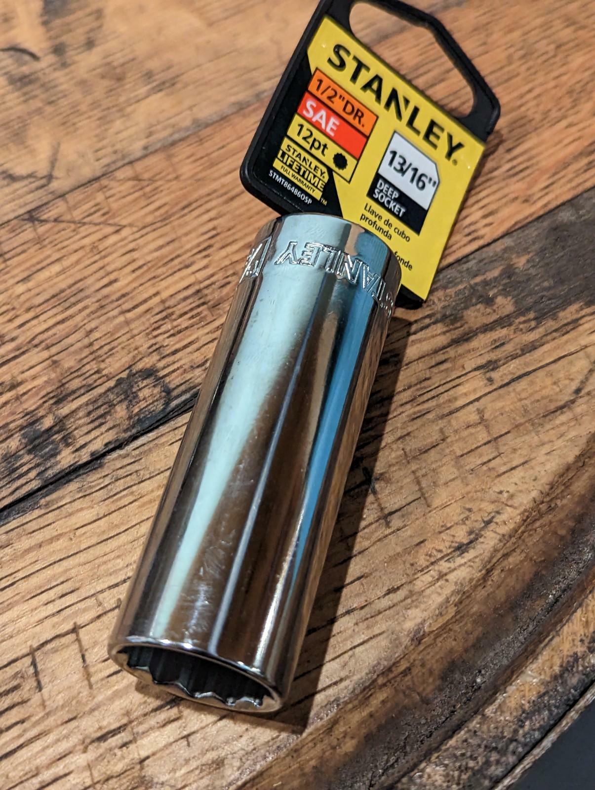 Stanley socket tool on a wooden surface with Stanley branding visible
