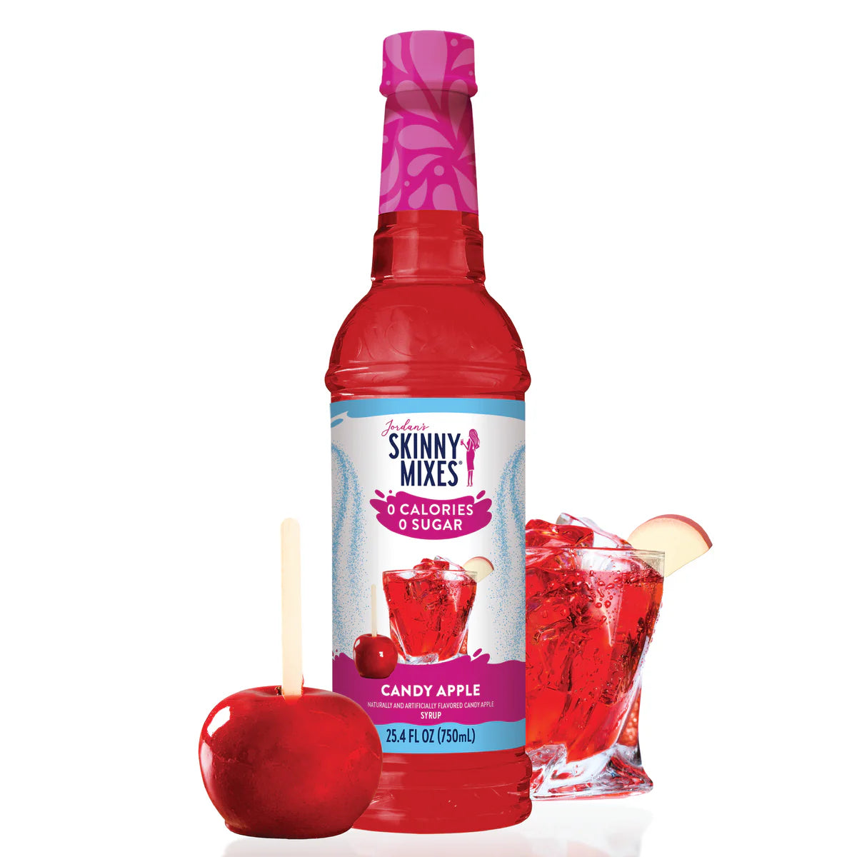 A bottle of Jordan's Skinny Mixes Sugar Free Candy Apple Syrup with a glass of syrup-based beverage and a red candy apple next to it.
