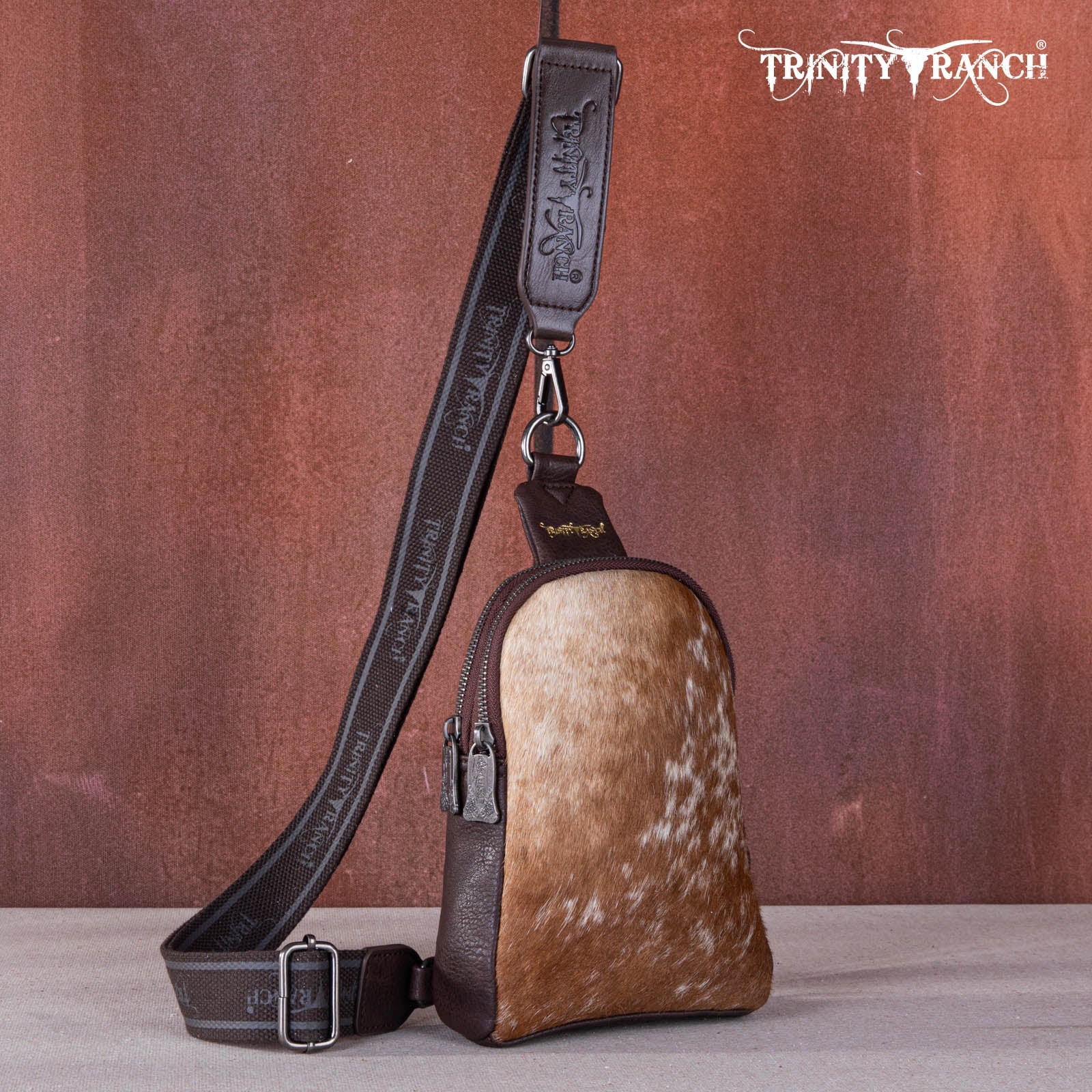 Trinity Ranch Genuine Hair-On Cowhide Sling Bag