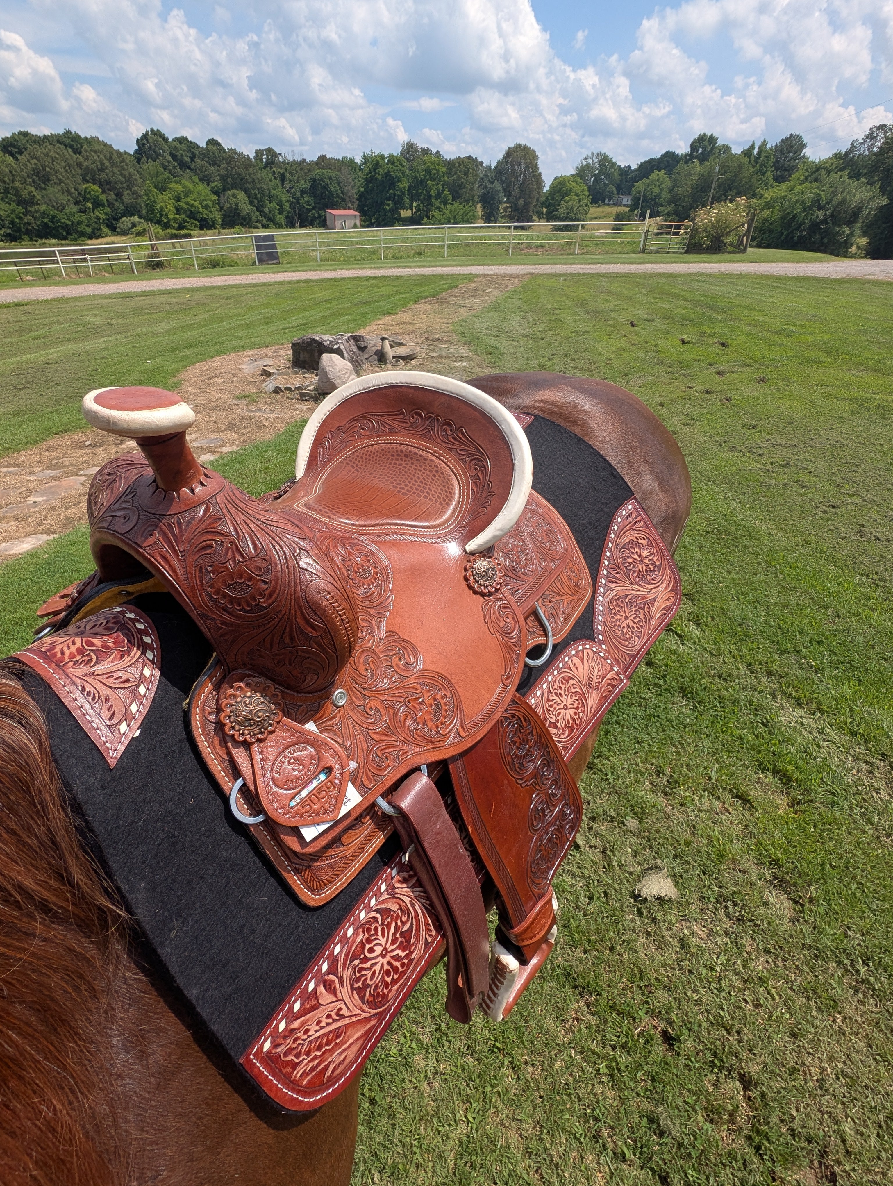 Tooled leather Stockyard youth saddle with deep seat and horn