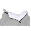 A fleece seat saver pad placed on a saddle, with elastic straps visible on the sides.