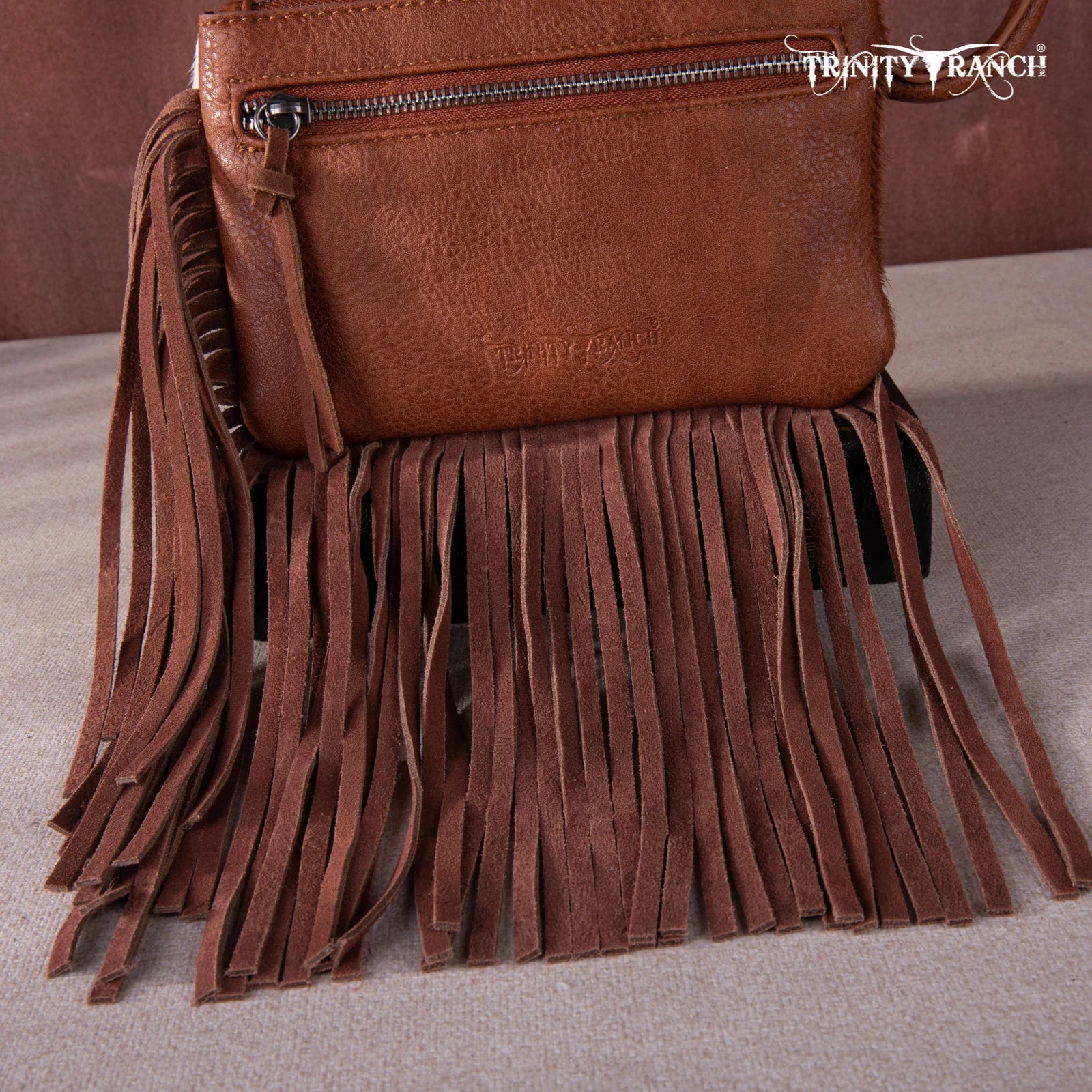 Unique handcrafted cowhide clutch – no two are the same