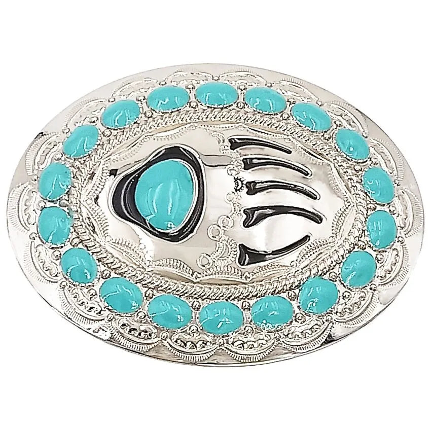Decorative belt buckle with turquoise stones and black paw prints on a white background