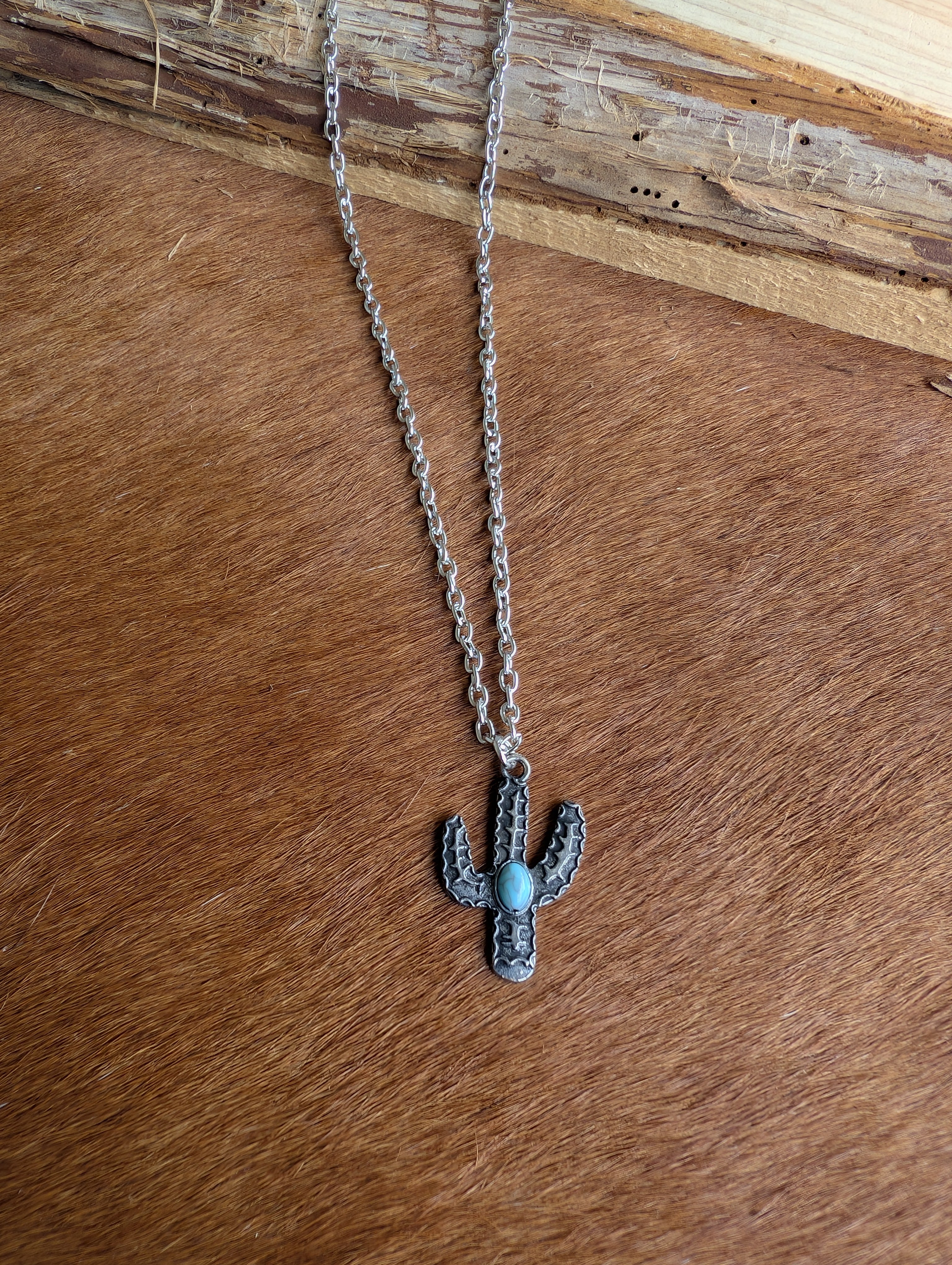 Turquoise rhinestone cactus necklace in antique silver finish