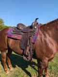 Used 15in circle y trail saddle on a horse right view. 
