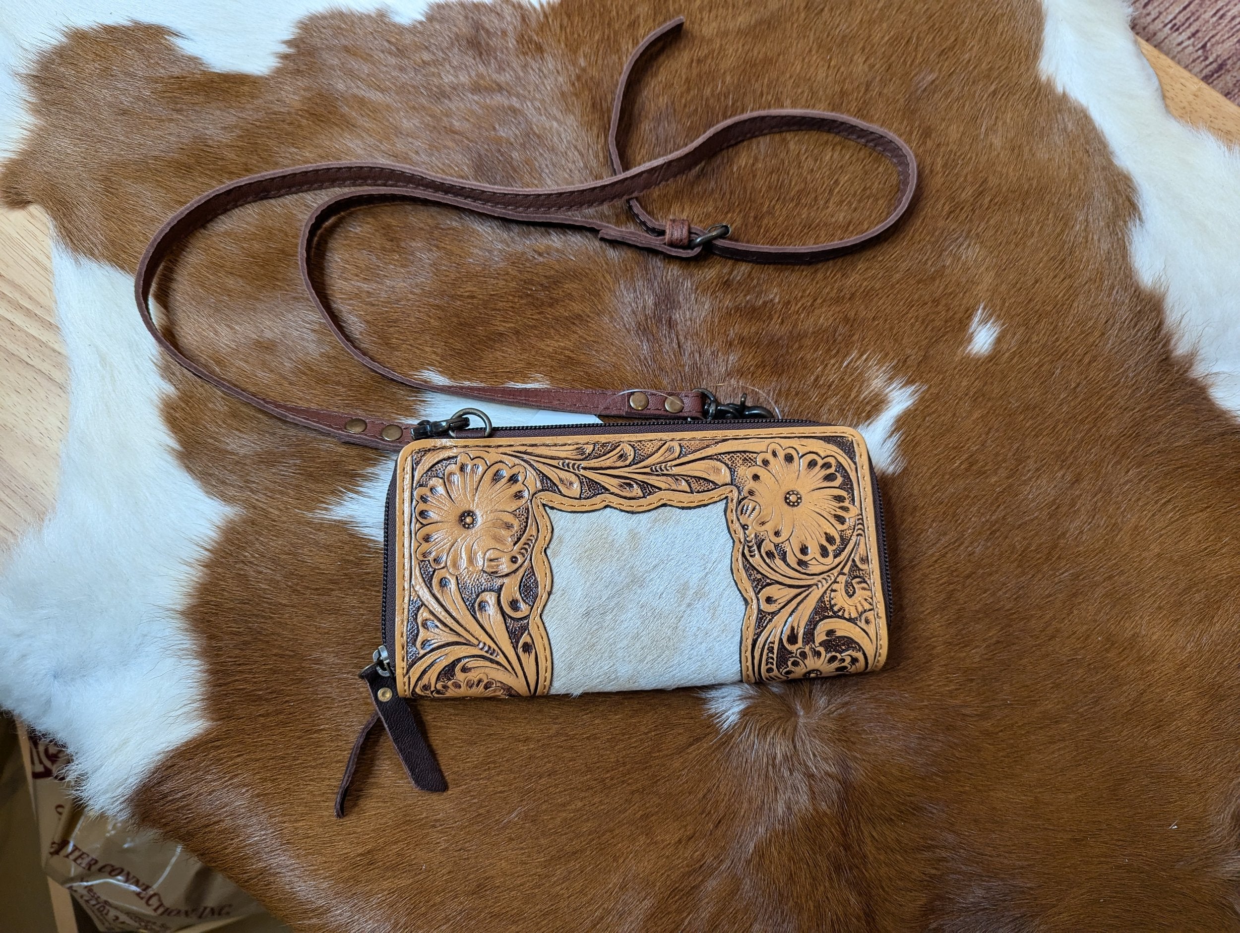 WL Leather crossbody wallet.