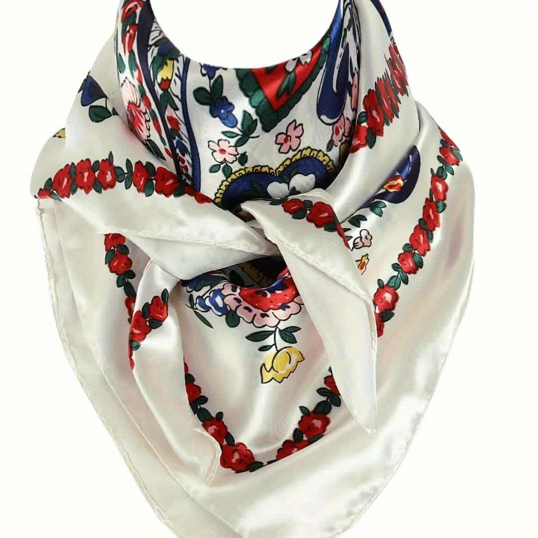 Colorful patterned scarf with floral and abstract designs on a white background