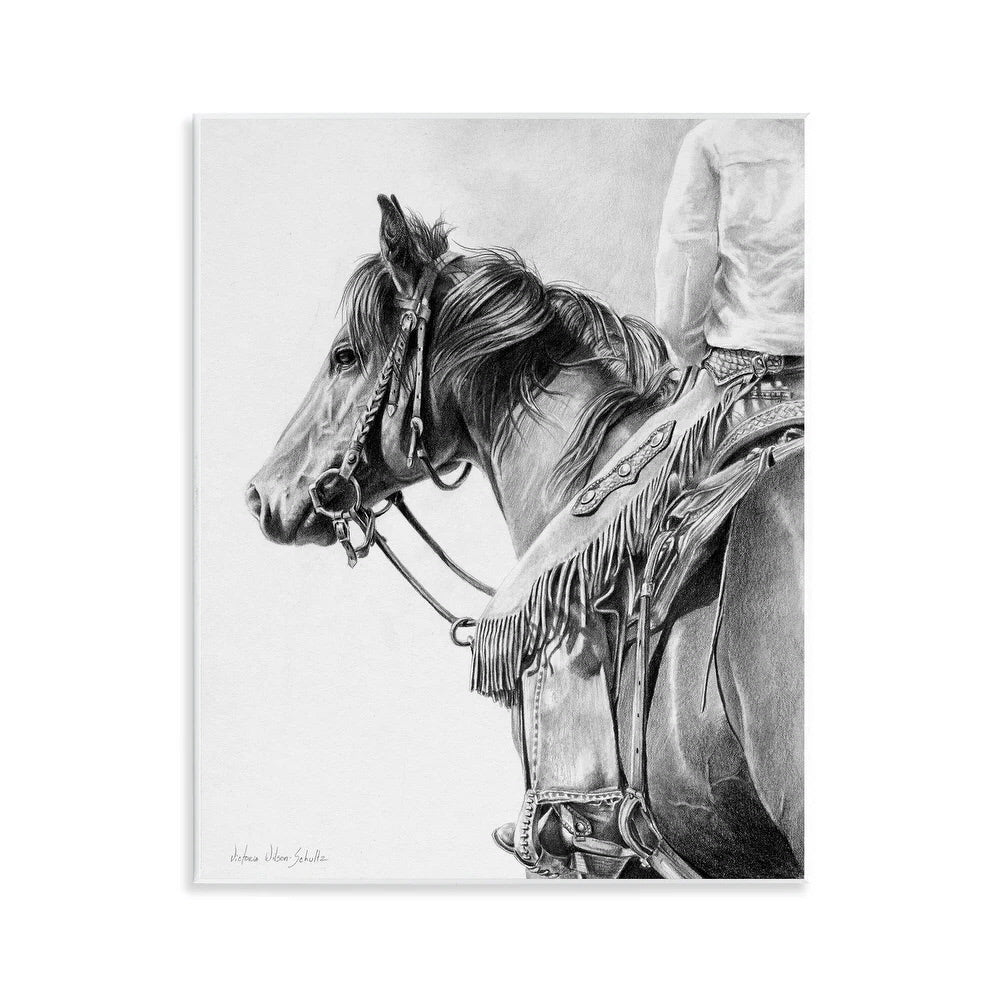 Black and white canvas art of a horse with a rider wearing a chaps and spurs.