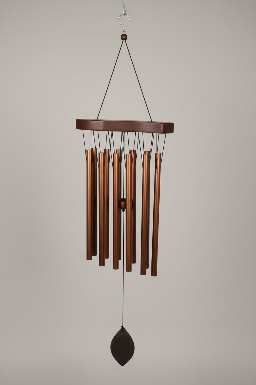 Wind chime hanging on gray background