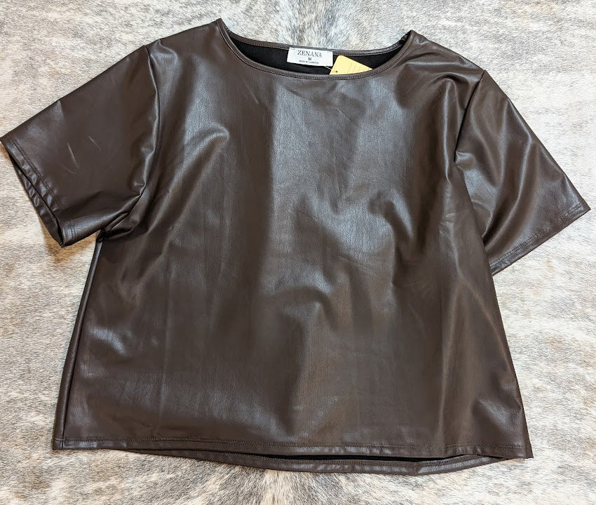 Zenana Brown Vegan Leather Top & on a stone grey surface