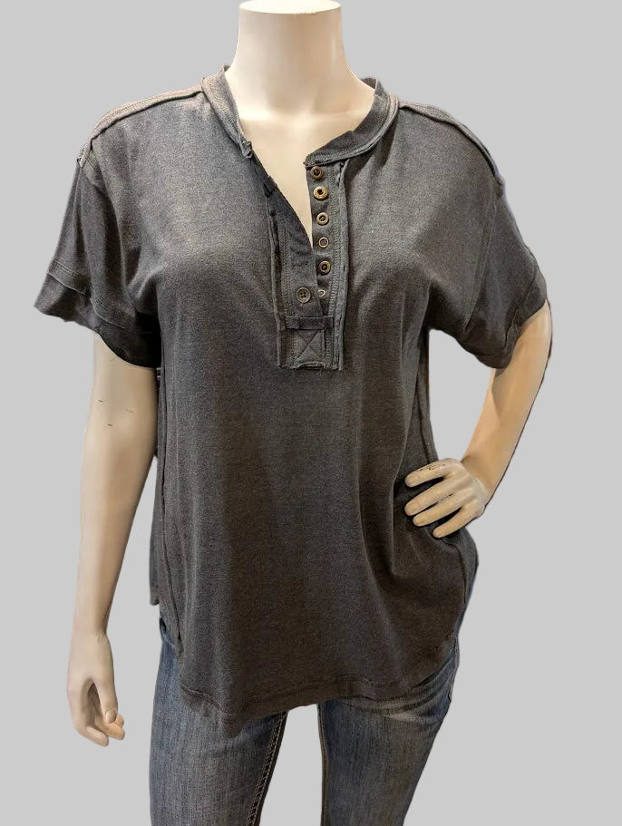 Mannequin wearing a dark gray short-sleeve shirt with buttons with a white background.