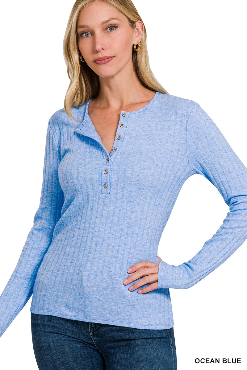 Zenana blue ribbed long sleeve top on a lady wearing jeans.
