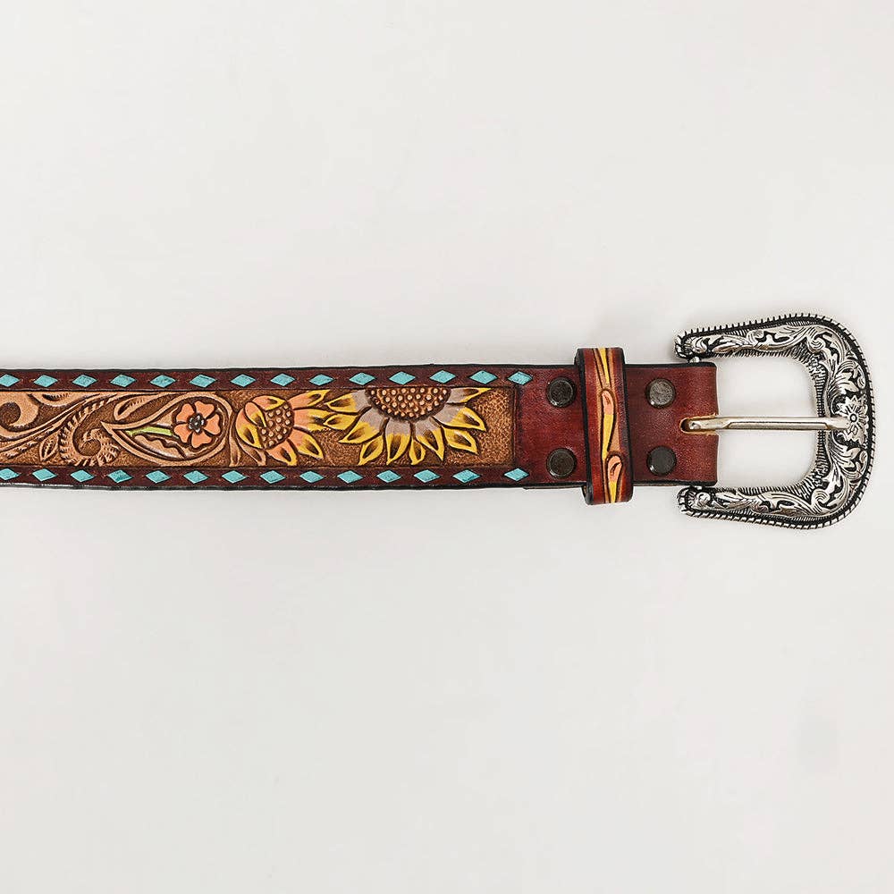Decorative leather belt with floral patterns and a silver buckle on a white background