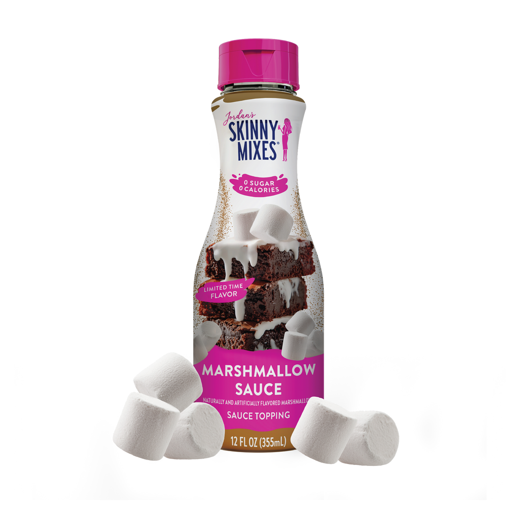 Bottle of Skinny Mixes Marshmallow Sauce with marshmallows on a white background
