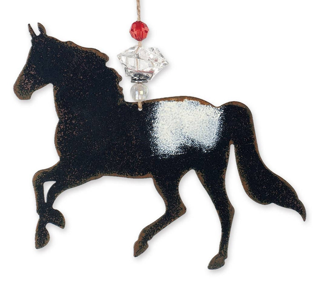 Decorative horse ornament with a white and red crystals
