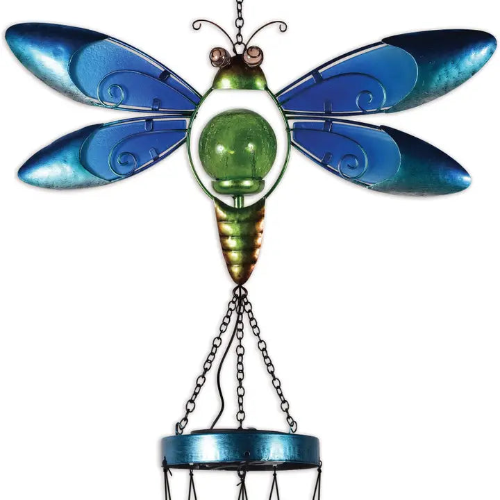 Decorative solar light shaped like a dragonfly with blue and green colors that tops a wind chime