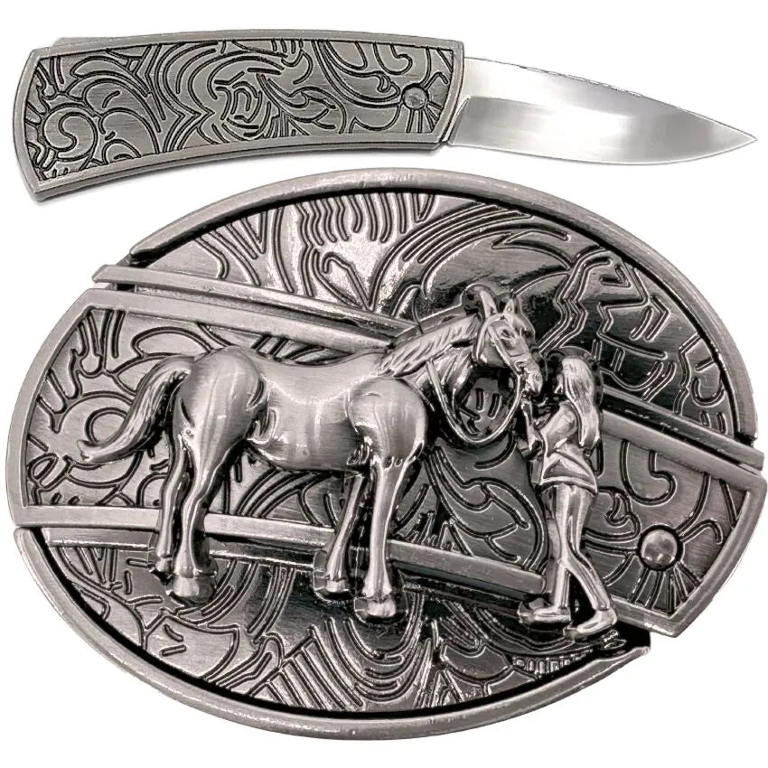 Silver belt buckle with horse and rider design on a white background with folding knife above it