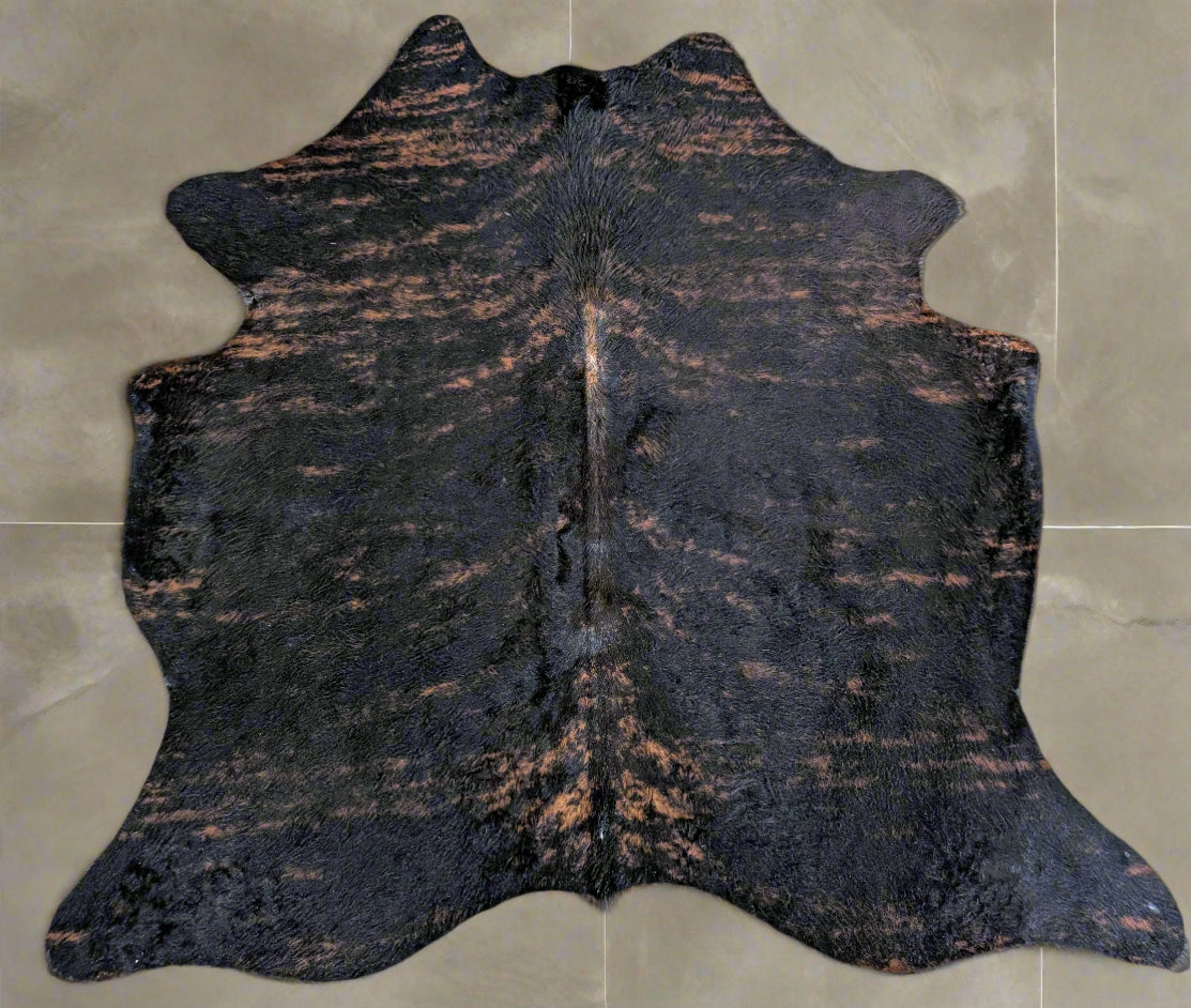 Individually named Bungle a cowhide in a brindle coloring.