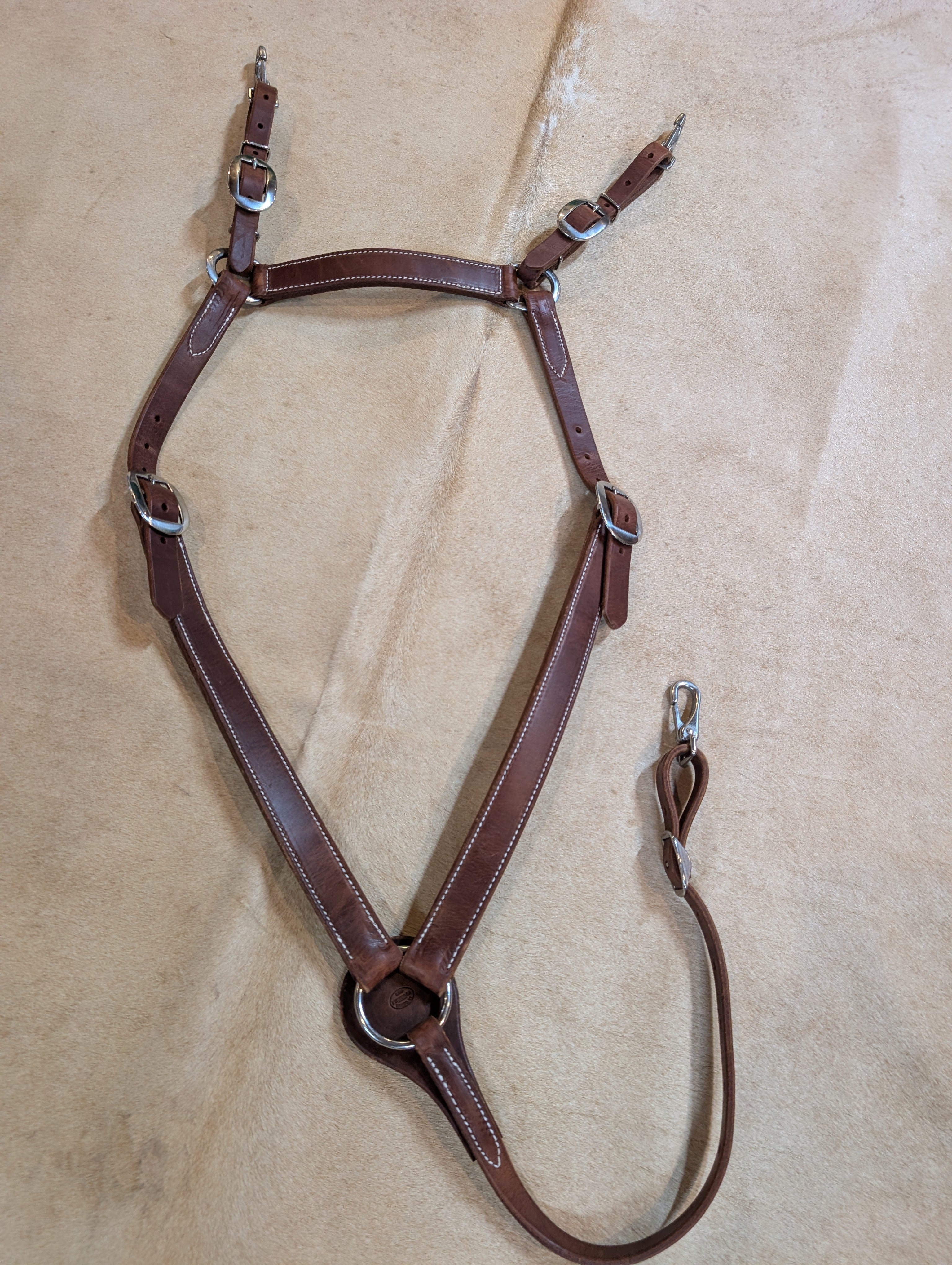 Custom Herman Oak leather Montreal style horse breast collar in rich brown leather.