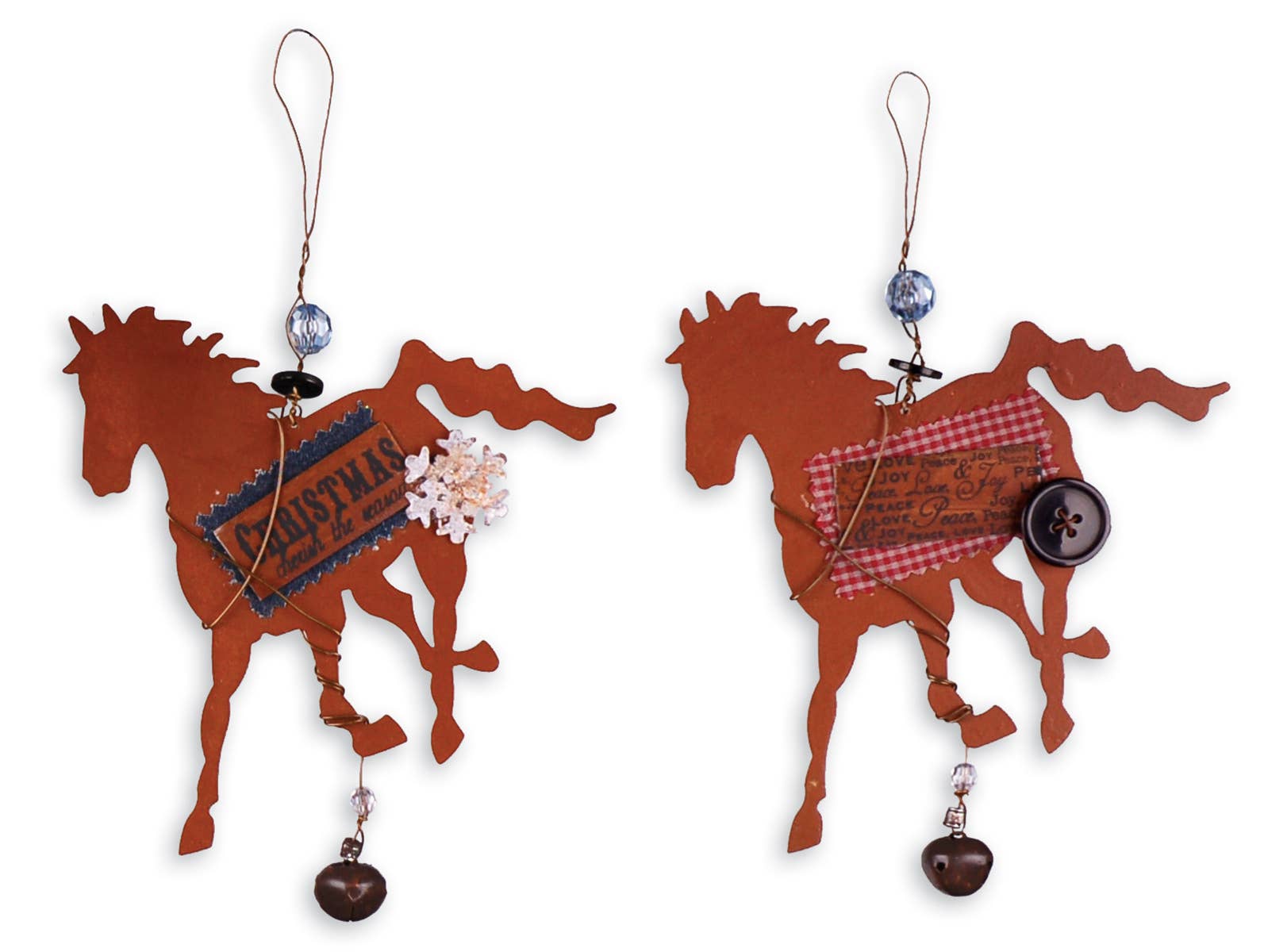Two rustic metal horse-shaped ornaments side by side. The left ornament has a dark brown label, a small white flower, and a dangling dark brown bell.