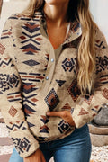 Person wearing a patterned fleece jacket outdoors