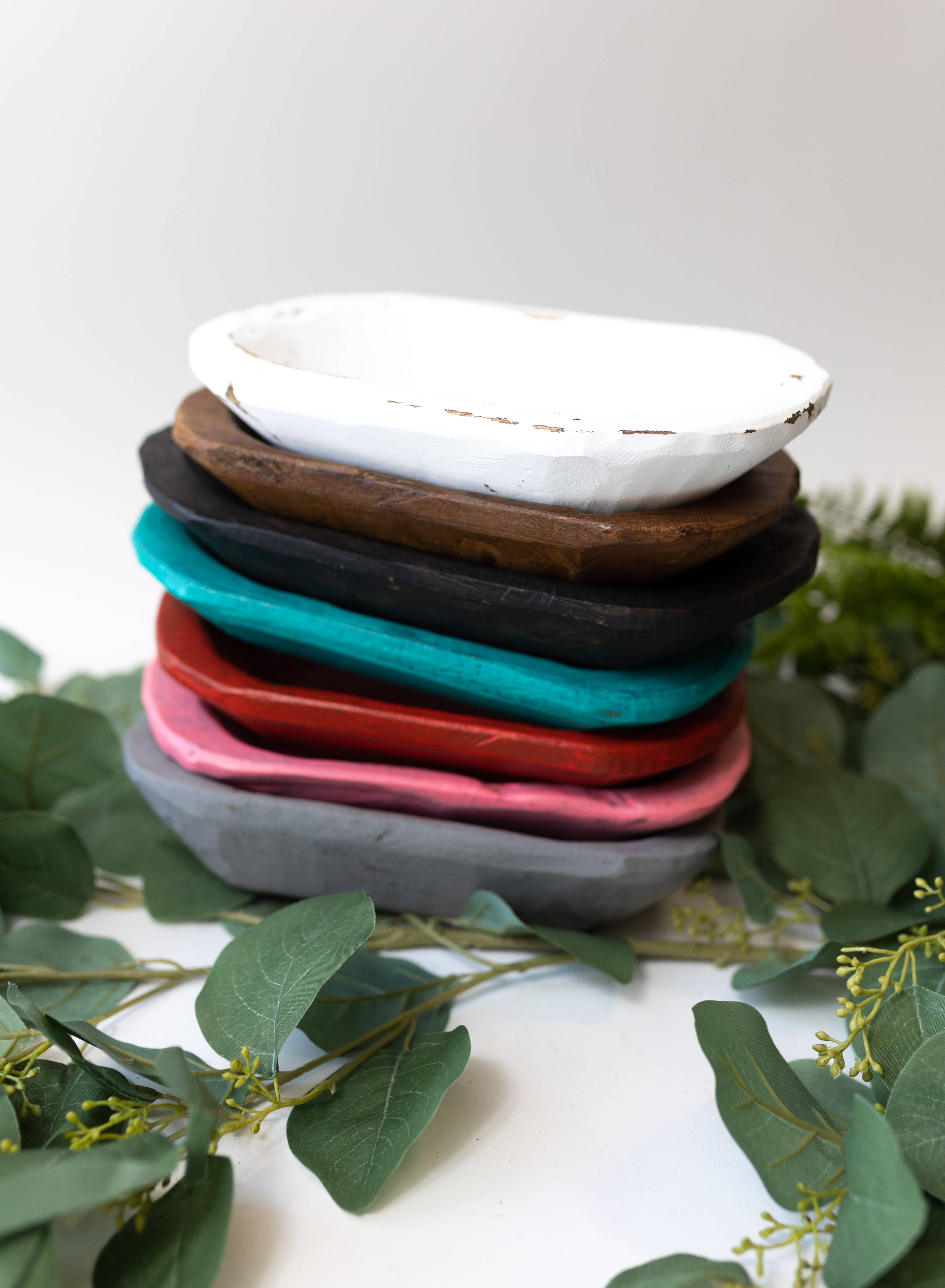 Rustic hand-carved wooden dough bowl with natural wood grain
