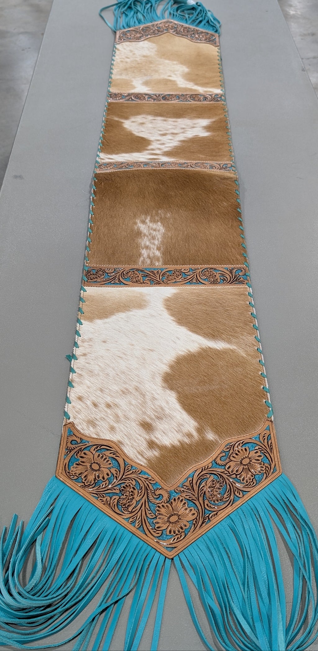 Rustic table runner made of real cowhide, perfect for farmhouse or restaurant décor