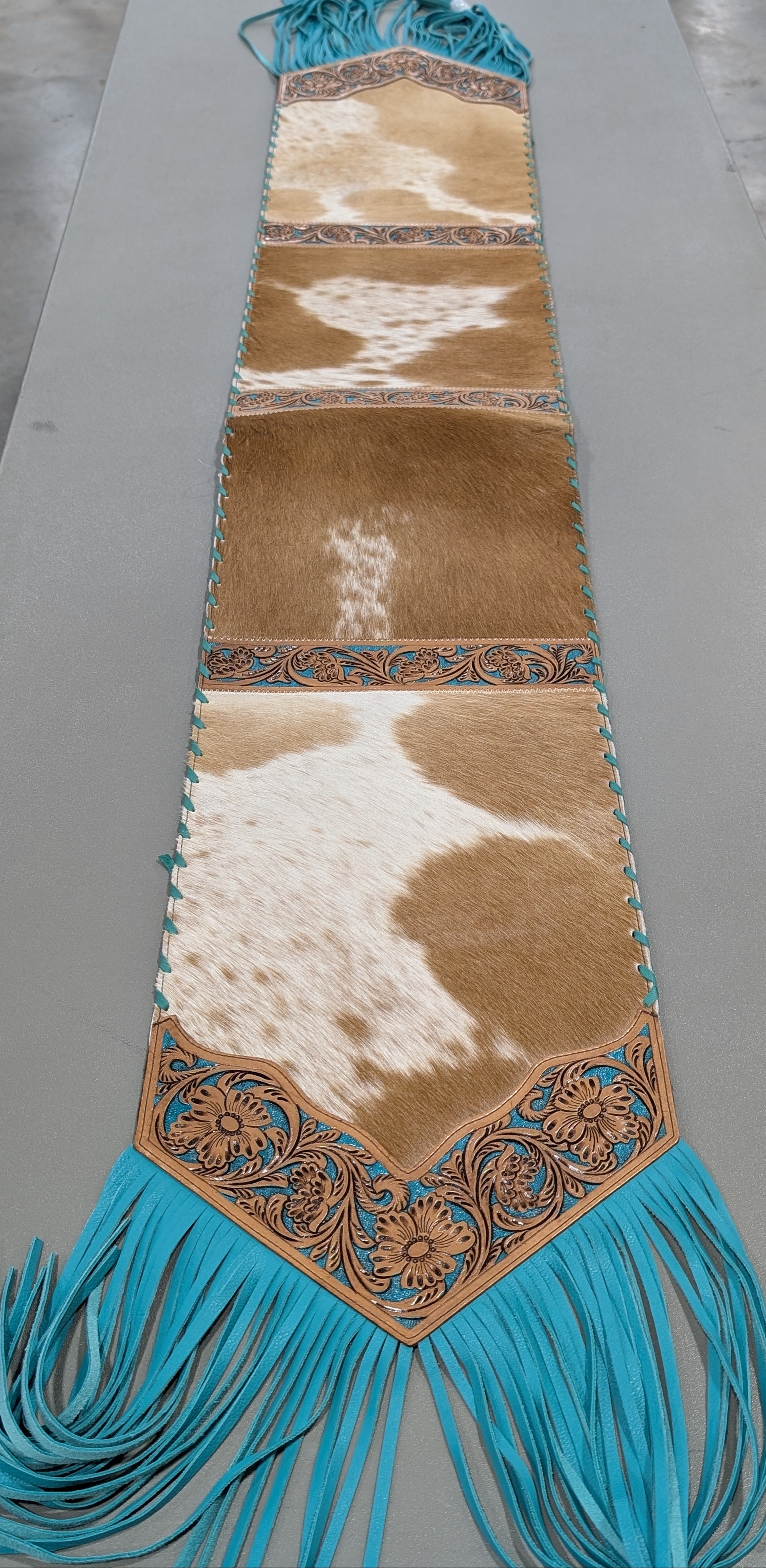 Rustic table runner made of real cowhide, perfect for farmhouse or restaurant décor