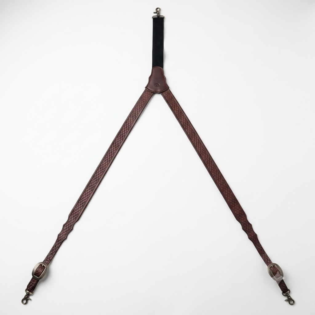 Brown hand-tooled genuine bridle leather Y-back suspenders with basket stamp pattern and metal scissor snaps.
