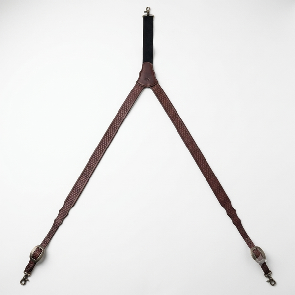 Brown hand-tooled genuine bridle leather Y-back suspenders with basket stamp pattern and metal scissor snaps.