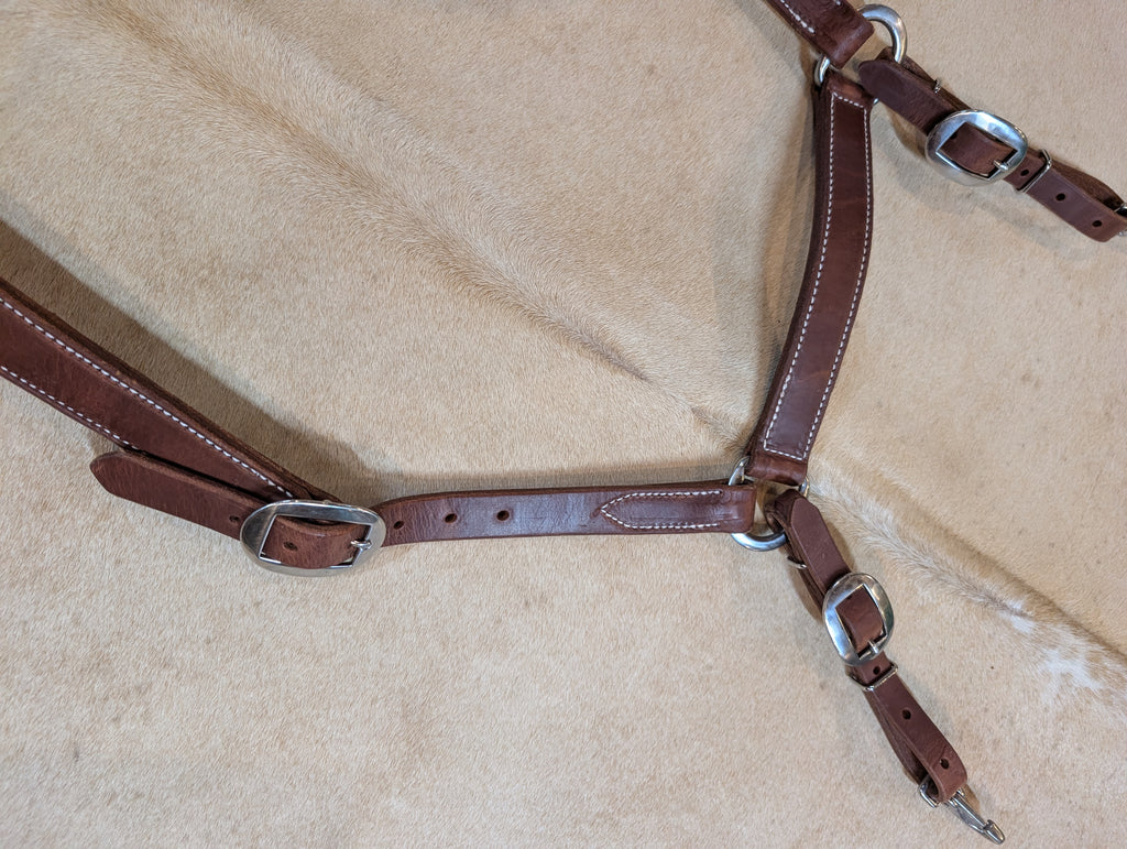 Ben Hostetler handcrafted Herman Oak leather Montreal breast collar for horses with adjustable tug straps.