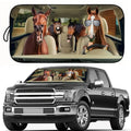 Car sun visor with cartoon horses and a truck with a similar design.