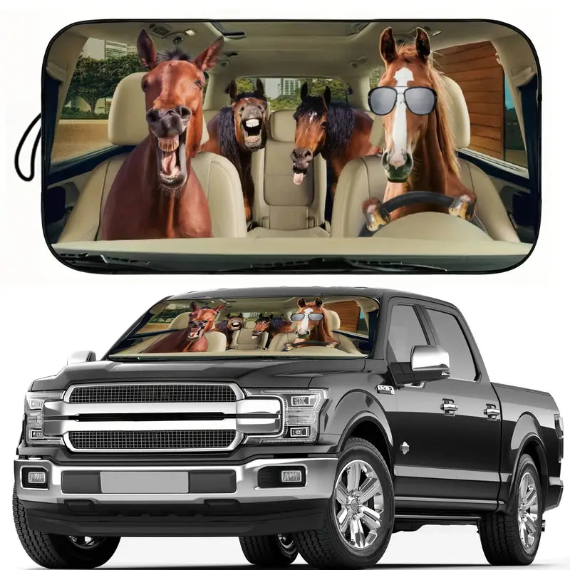 Car sun visor with cartoon horses and a truck with a similar design.