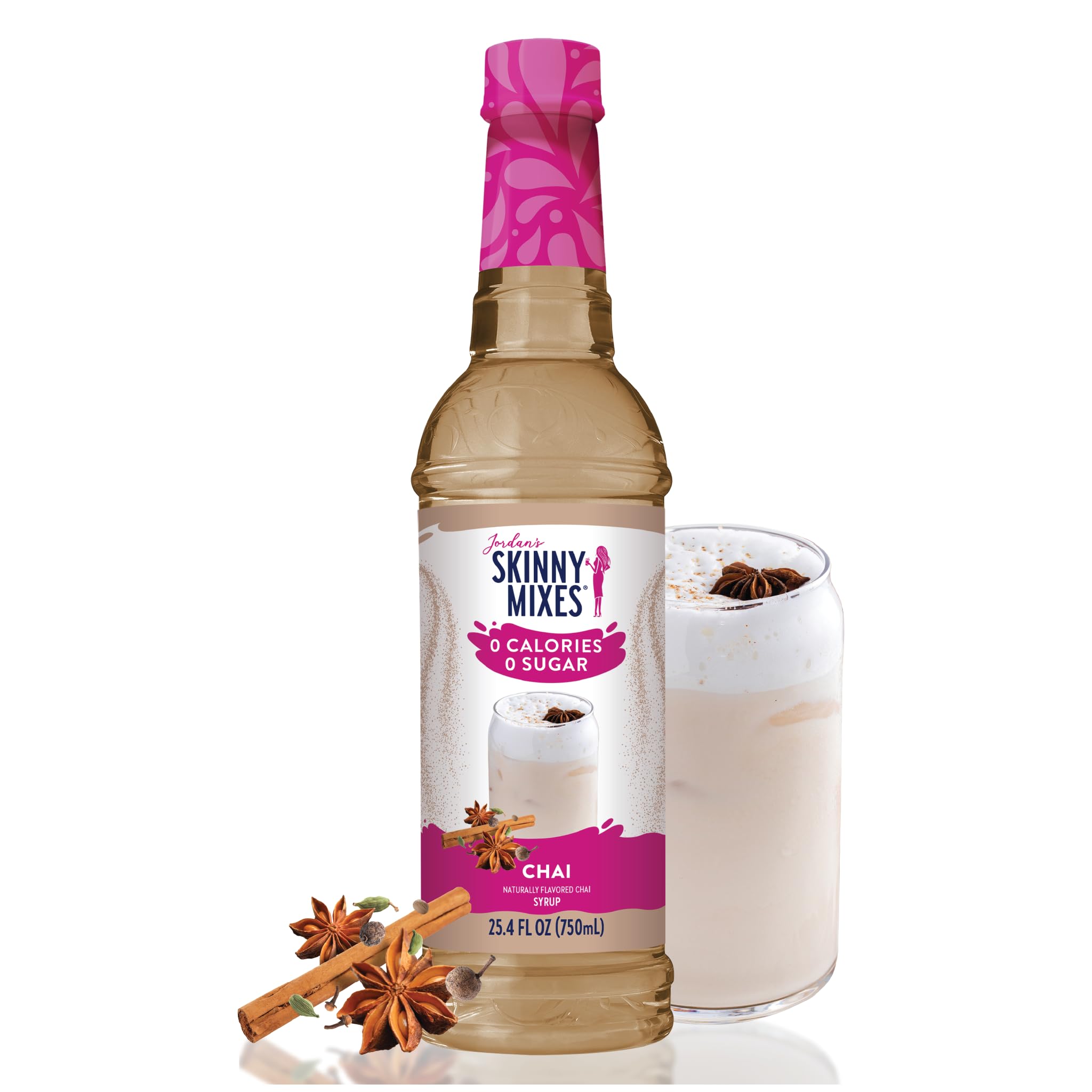 Jordan's Sugar Free Chai Syrup with a glass mixing cup next to it, along with cinnamon sticks as garnish.