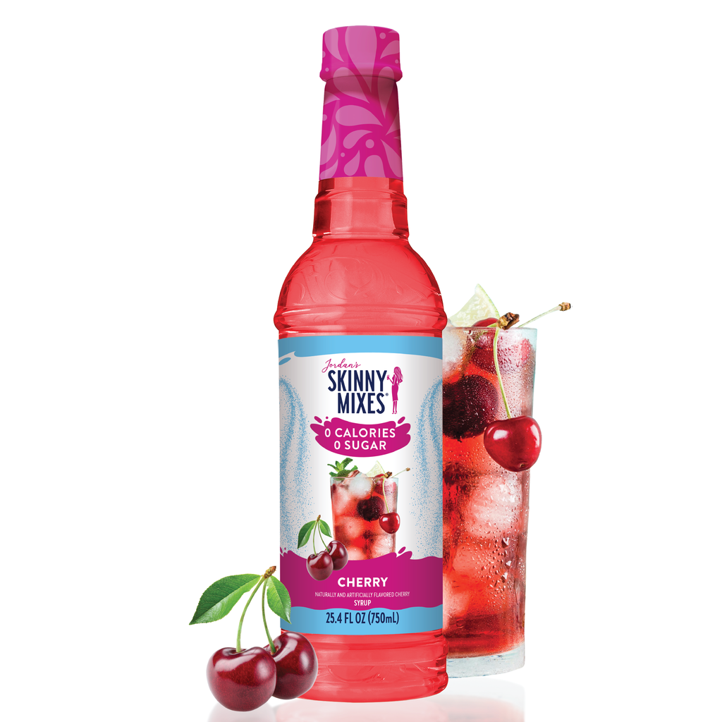 Jordan's Skinny Mix Cherry Syrup in a 750ml bottle with a glass of cherry flavored water and ripe cherries to accent.