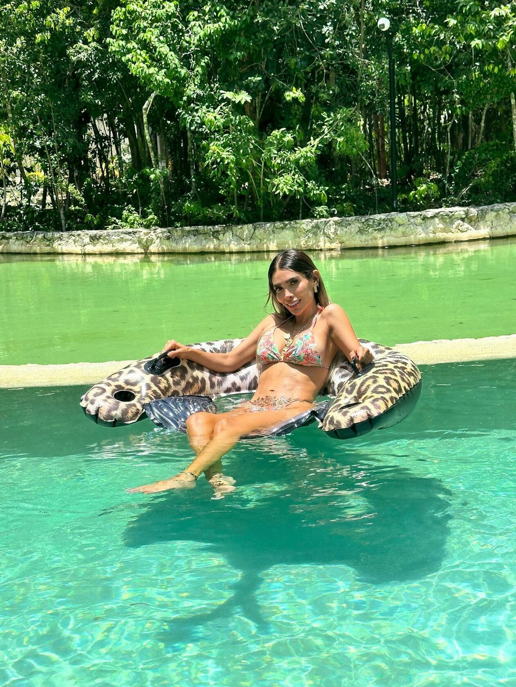 Trendy leopard pattern jumbo sun chair designed for pool, beach, or lake lounging