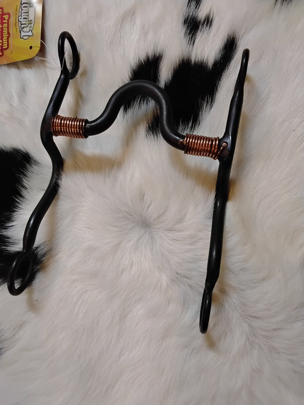 Kelly Handcrafted High Port Western bit with black steel shank and copper wire inlay.